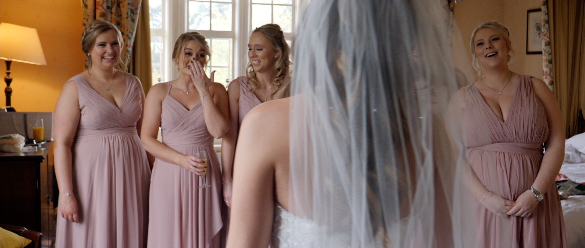 Bridesmaids reactions to wedding dress.jpg