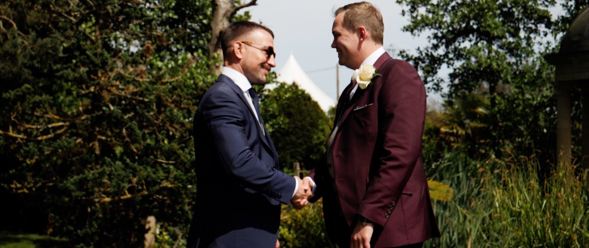 Best man and groom handshake wedding videos 3 cheers media.jpg