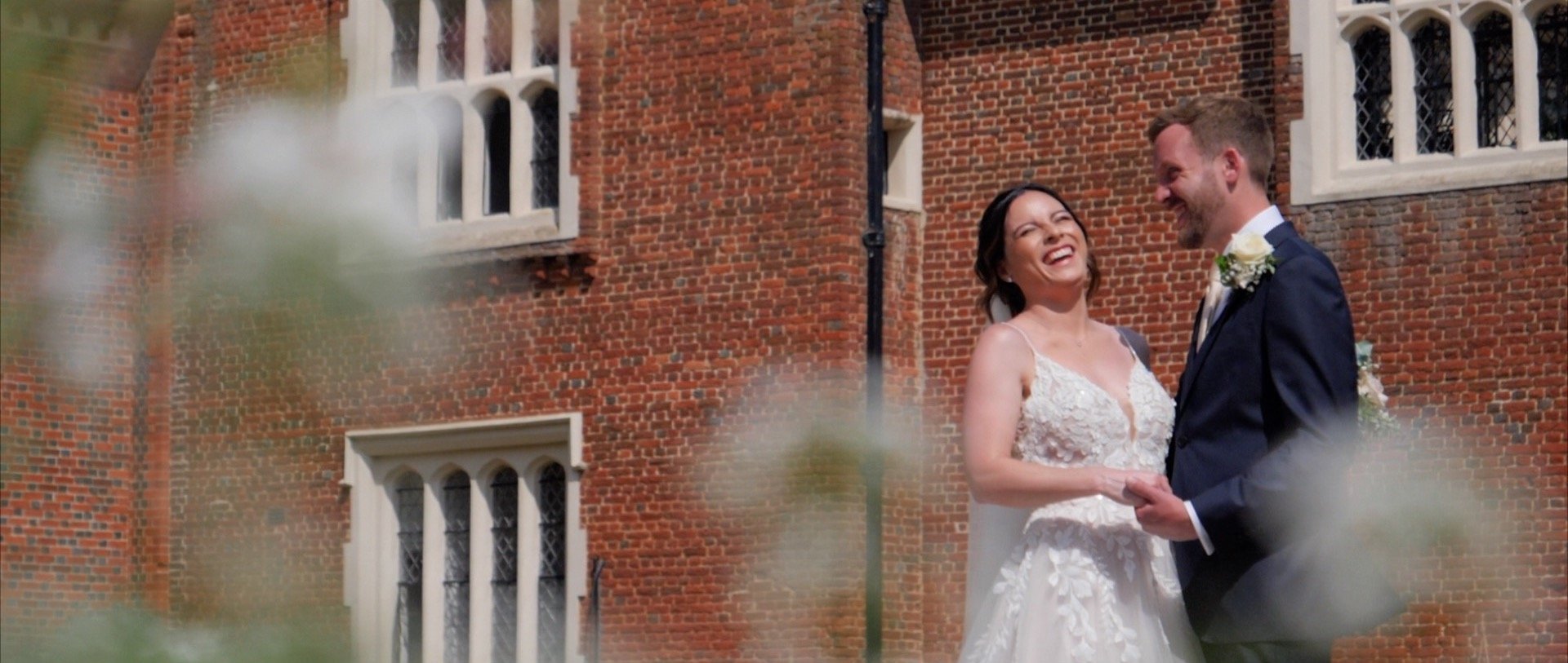 Laughter from the bride and groom at Gosfield Hall - Essex.jpg