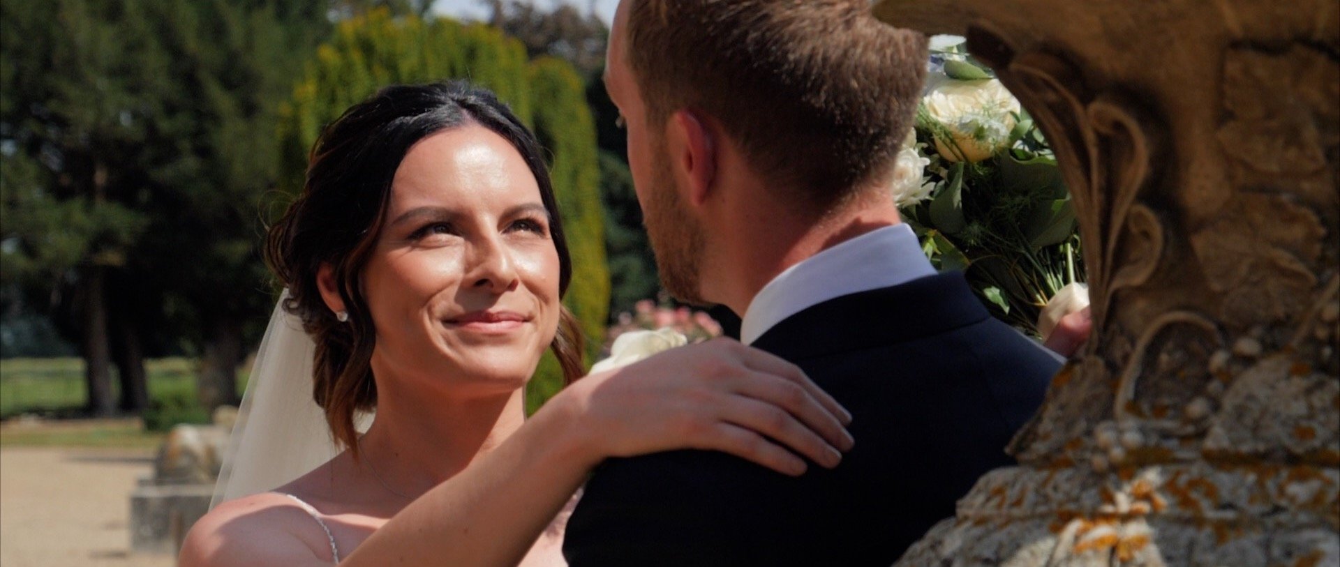Stunning smile on bride in wedding video - 3 Cheers Media.jpg
