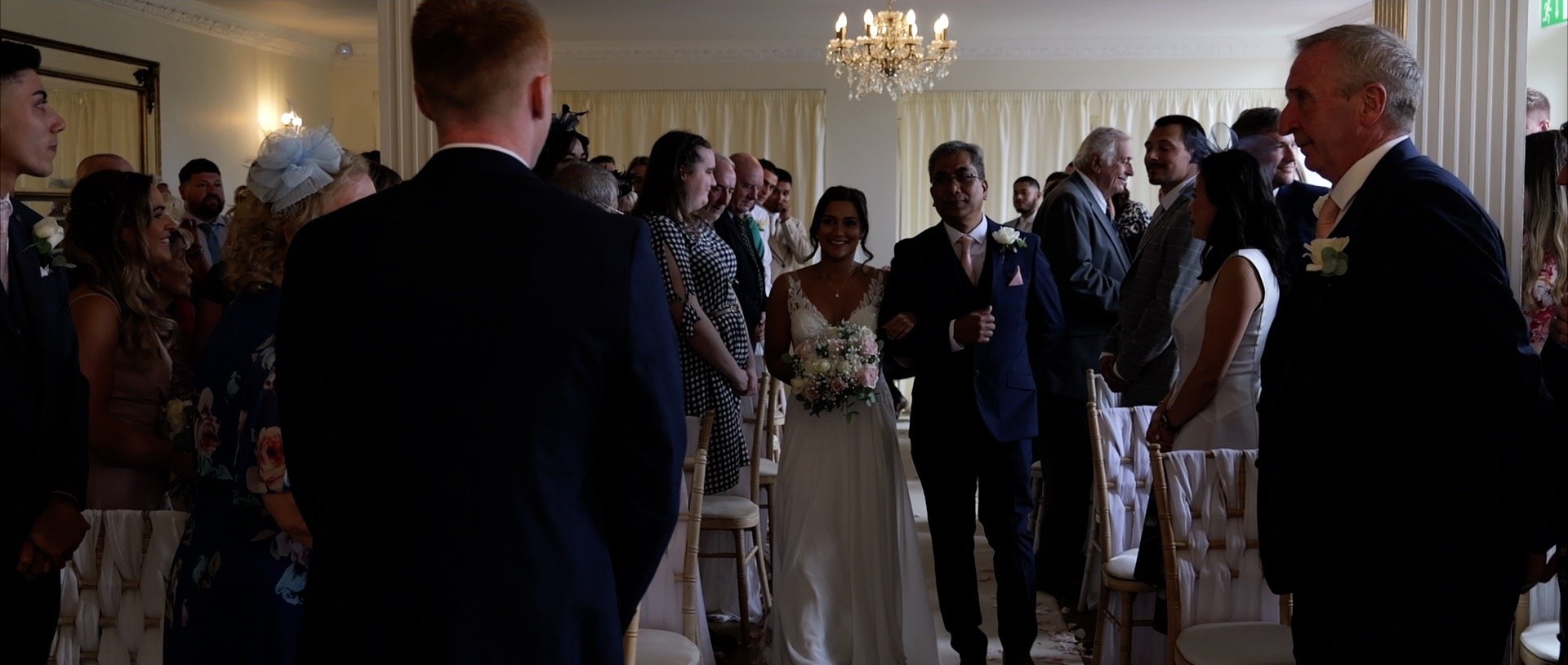 Bride walks down the Aisle at Quendon Hall - Essex wedding videos.jpg