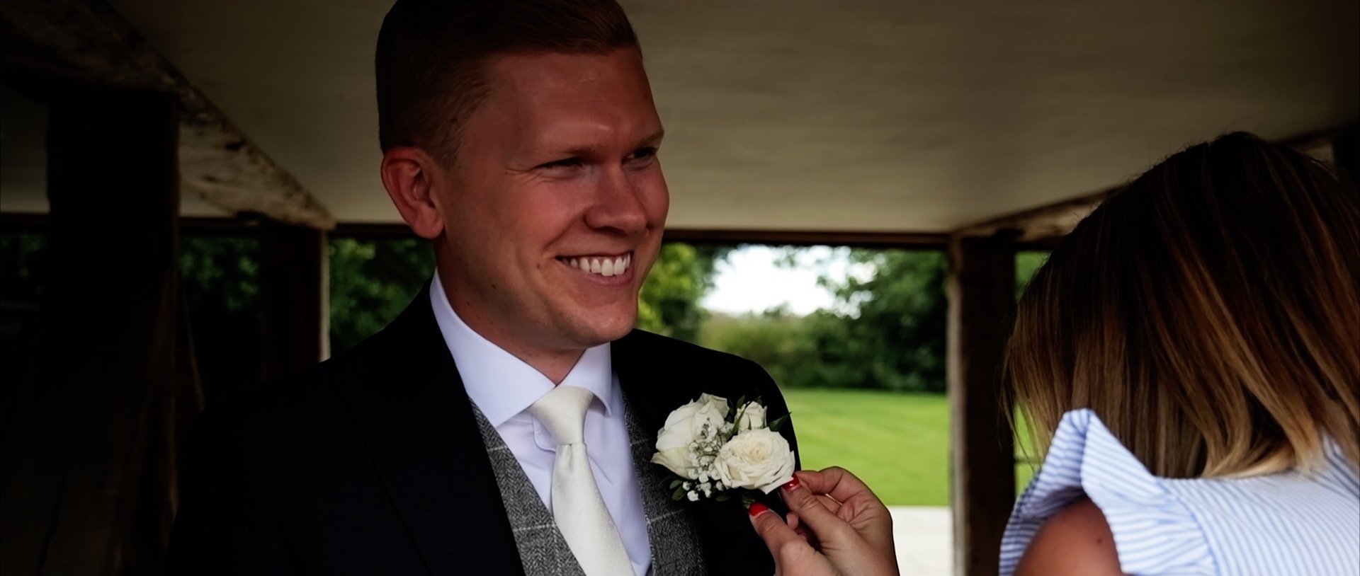 3 Cheers Media - Apton Hall Wedding Video - Groom's button hole.jpg