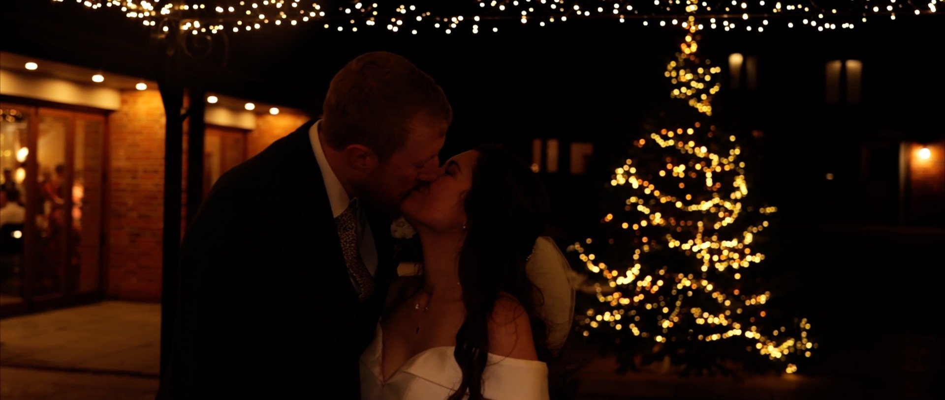 Apton Hall Wedding Videography - 3 Cheers Media - Christmas wedding kiss.jpg