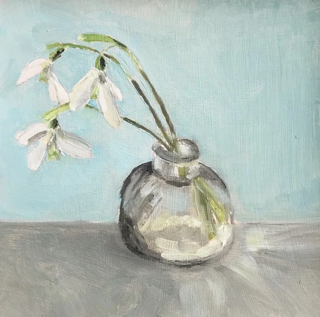 Three snowdrops, caught in the light