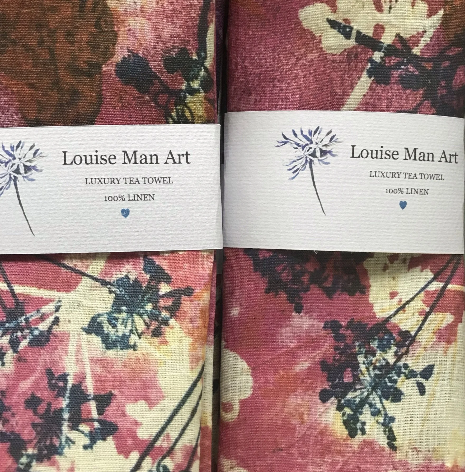 Botanical blue and white cow parsley on pink luxury tea towel