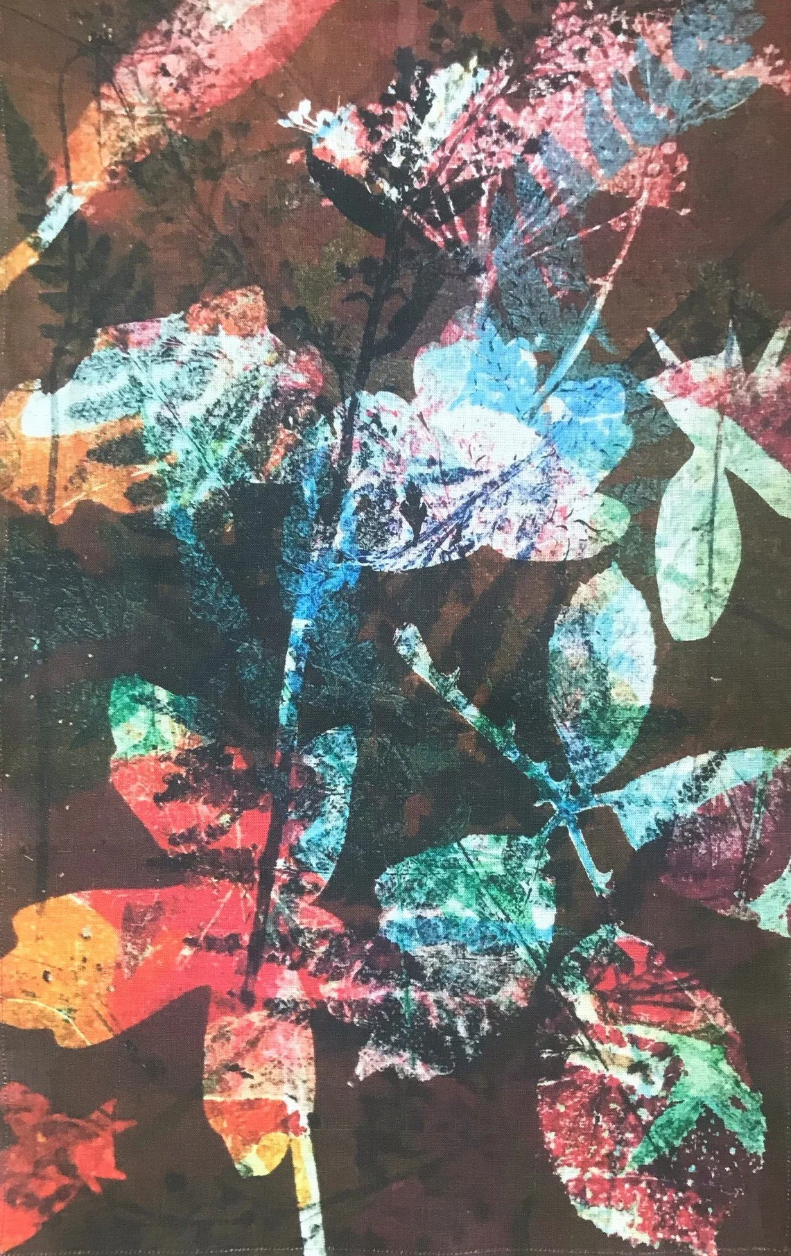 Tea towel with autumn colours of pinks and browns