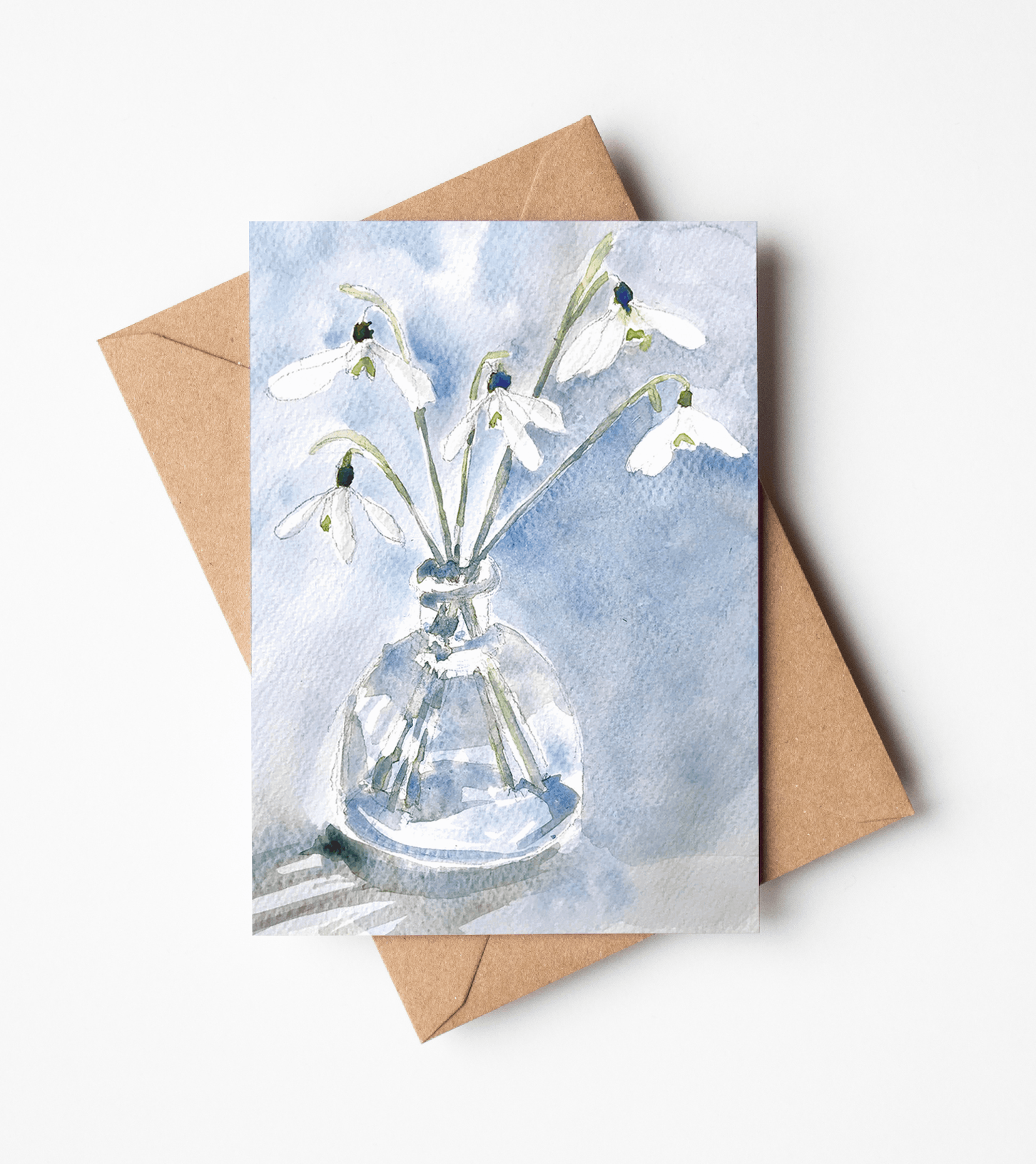 Snowdrops in a glass vase.png