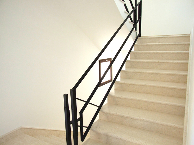 The Parlight Balustrade viewed from the lower floor, showing how the floating design creates an open sightline through the space.