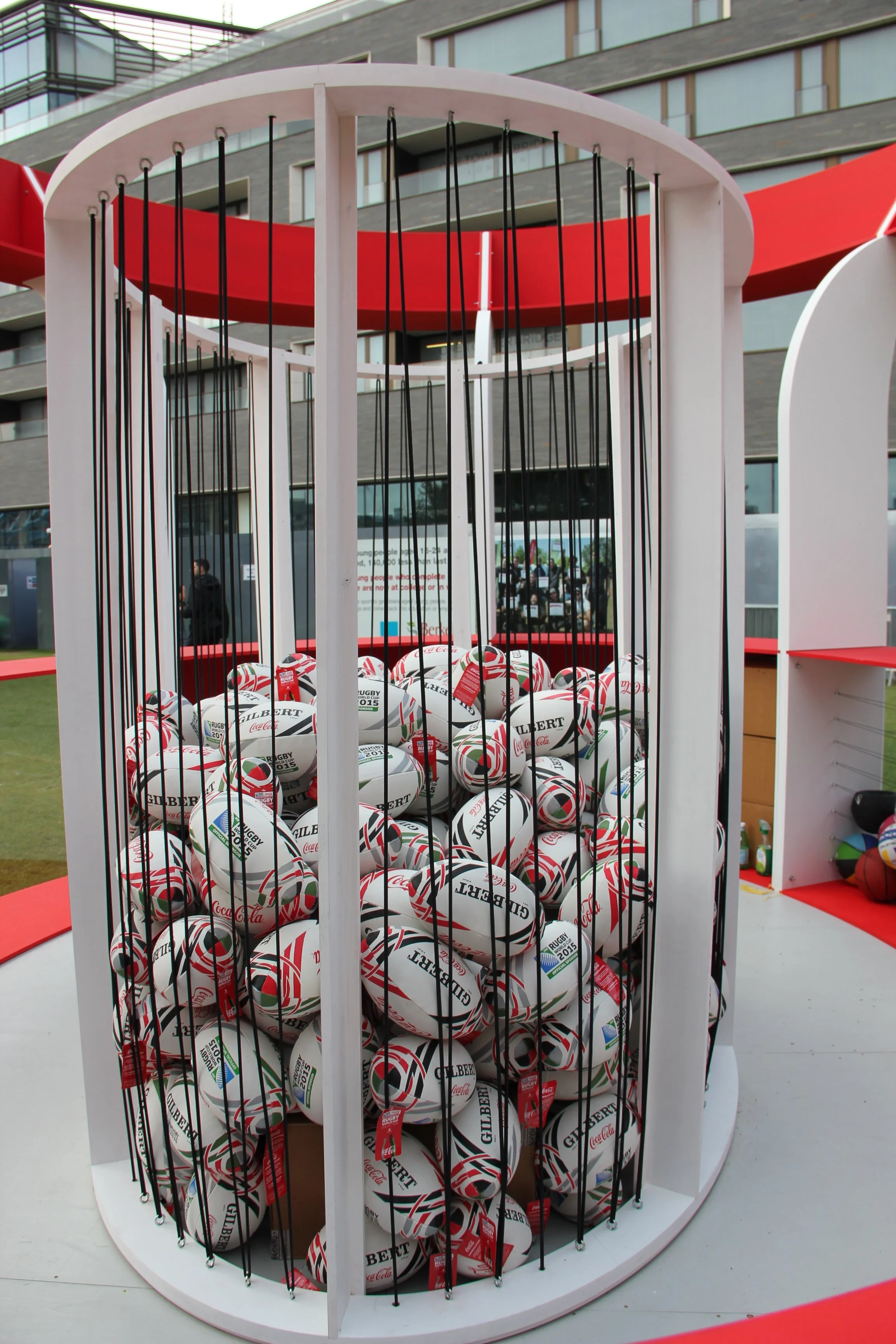 Giant Coca-Cola rugby ball pop-up structure at Potters Field Park for Rugby World Cup 2015.