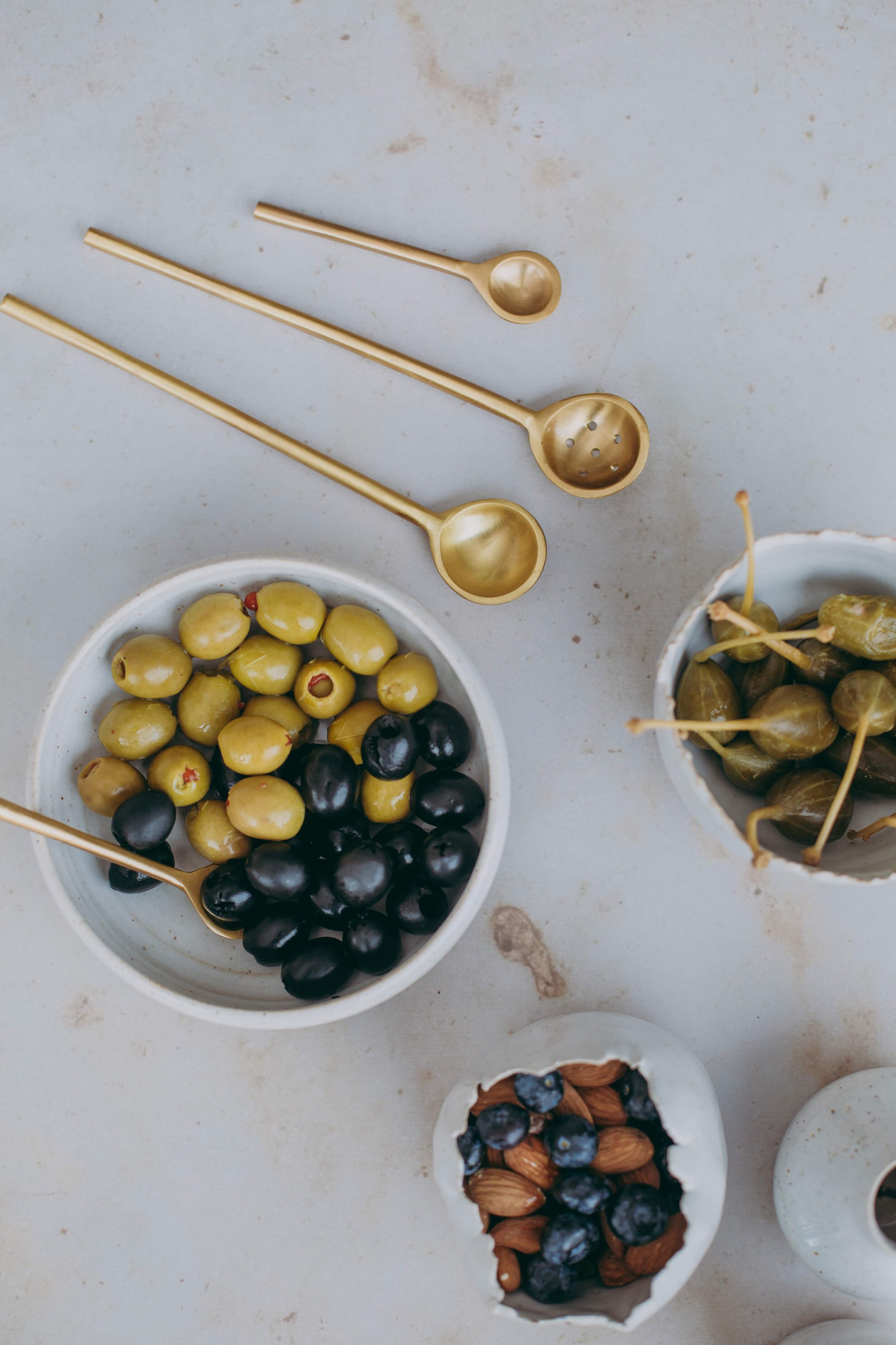H&R ceramics handmade and brass serving spoons.jpg