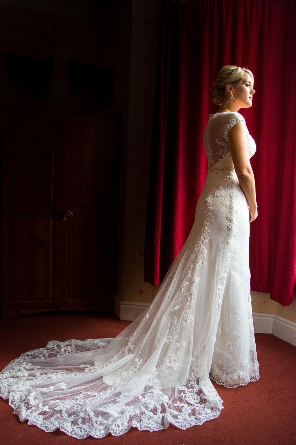 bride looks out the window