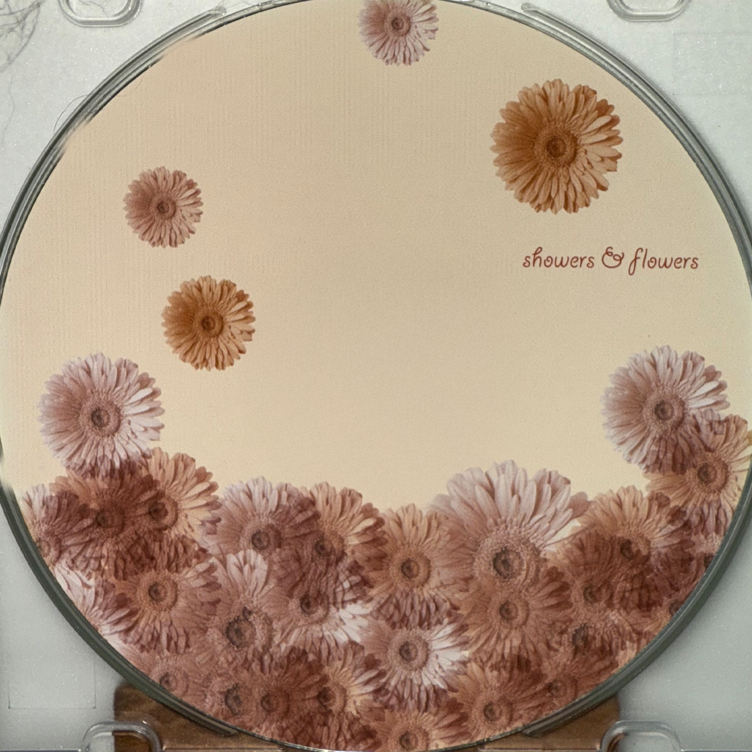 showersAndFlowers_DISC.png