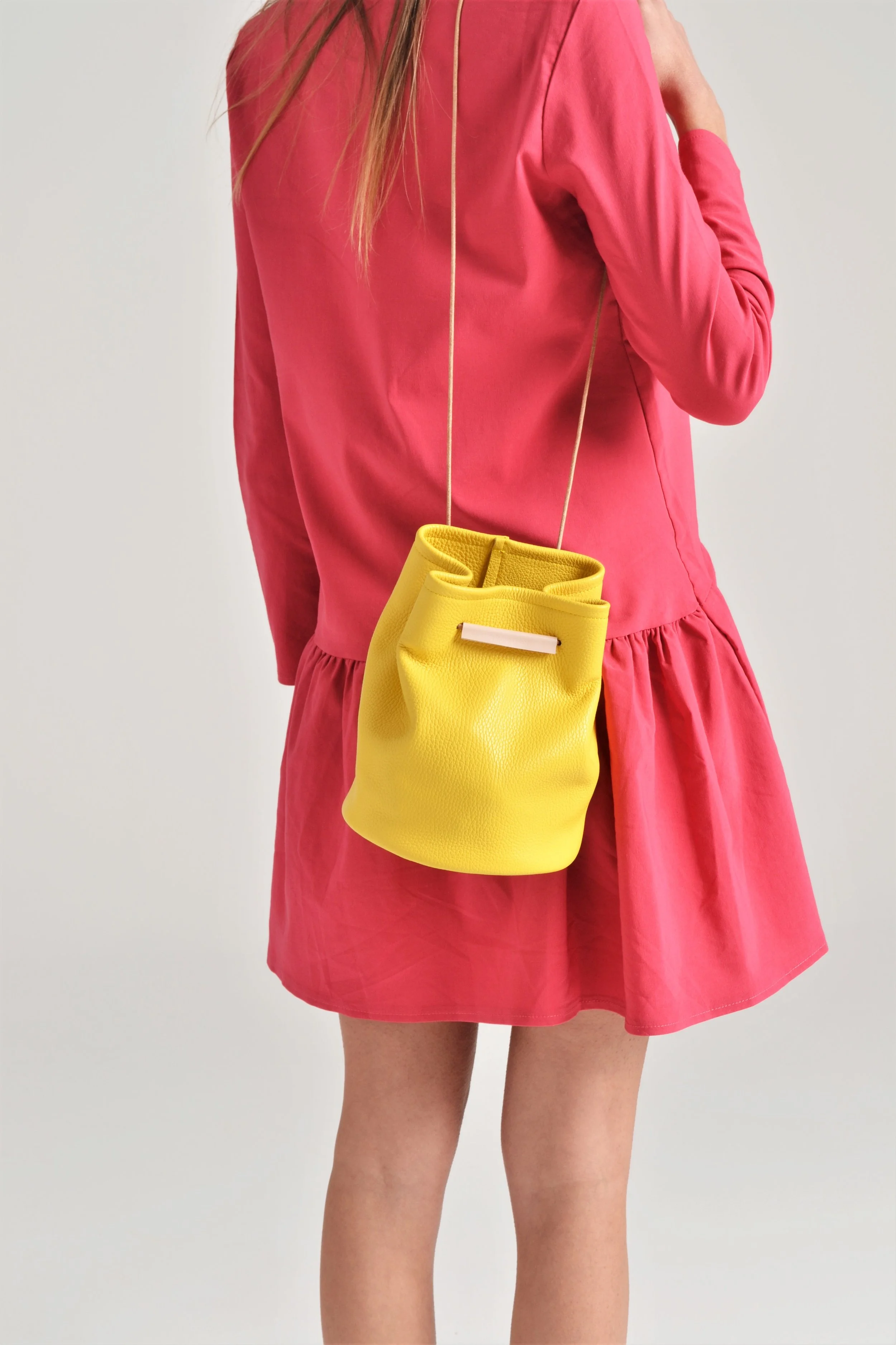 Ioli yellow bucket bag