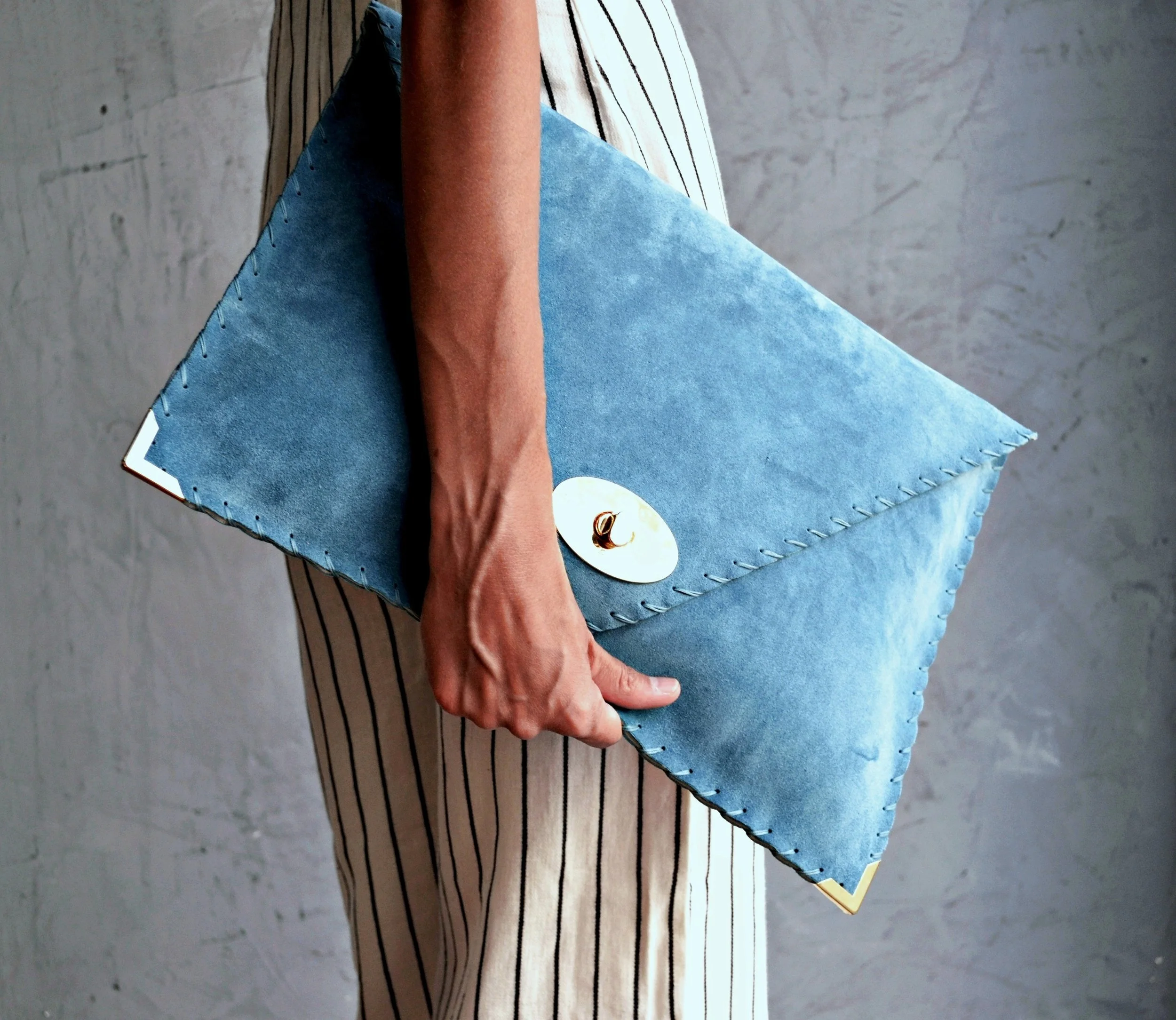 Symmetria soft clutch in jeans