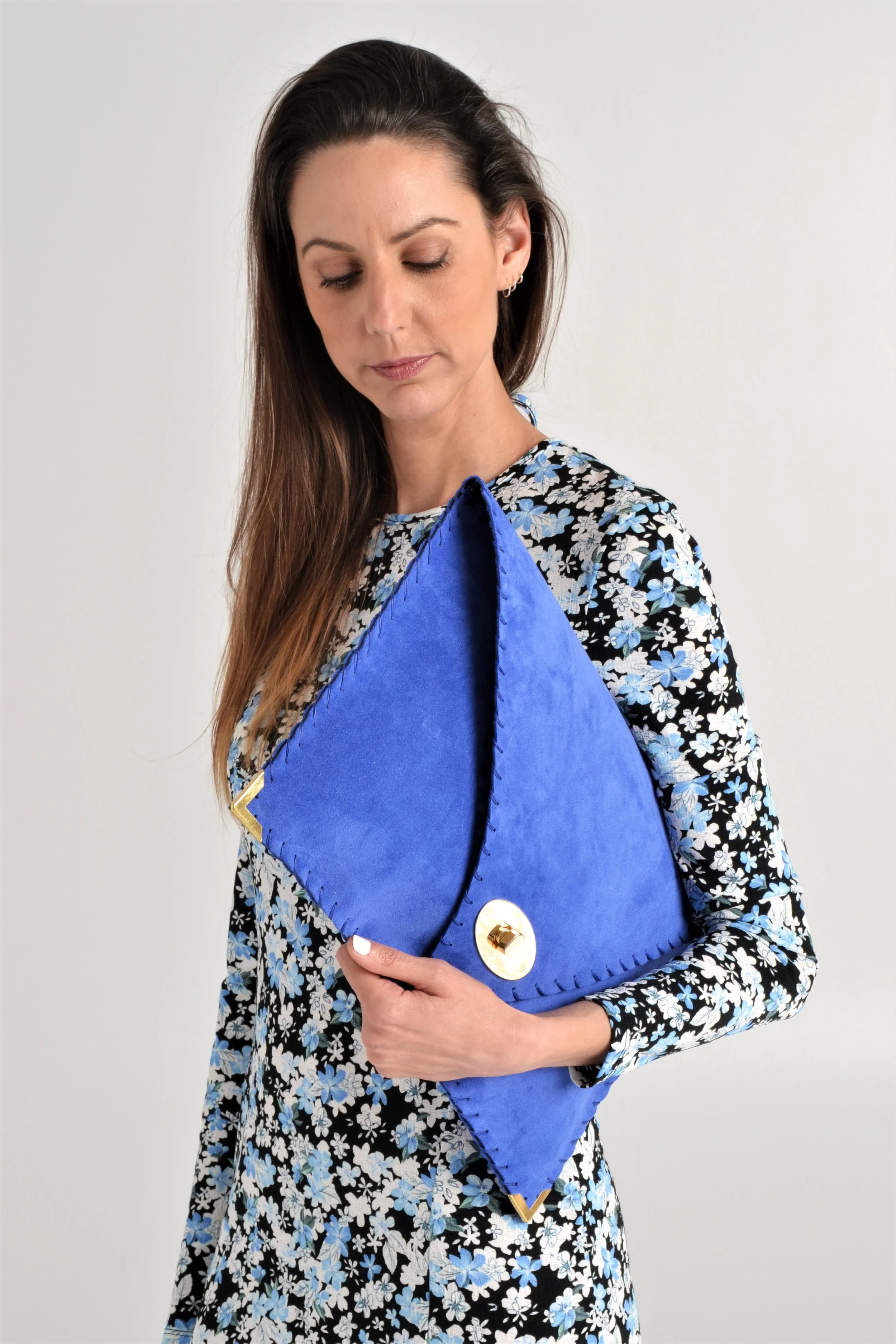 Symmetria soft clutch in blue