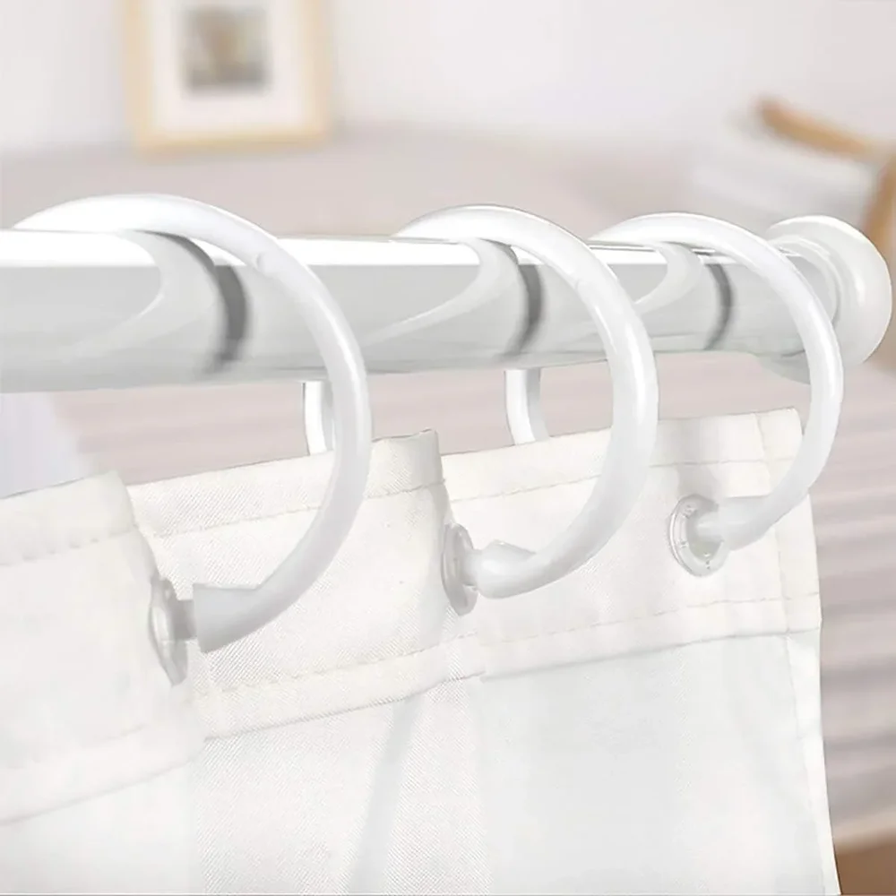 White plastic rings supporting a shower liner