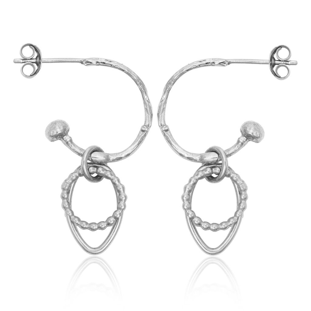 Sun Eye Silver Huggies.