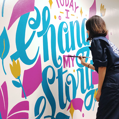 Making a School Shine with Playful Lettering Mural