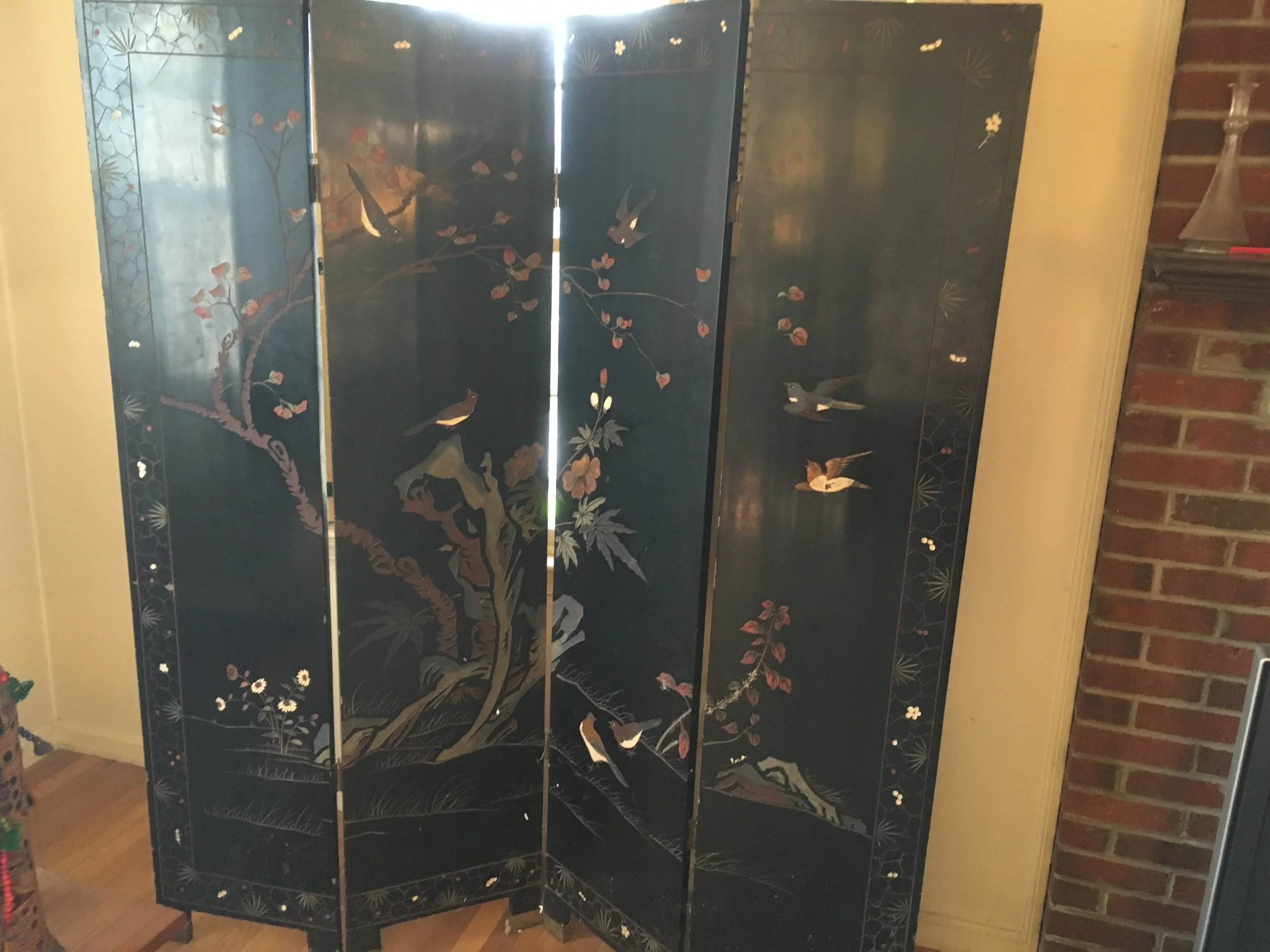 $1000 - Set of Four Black lacquer vintage Oriental scenic divider panels, 6', carved handpainted, gold leaf. minor wear and tear.