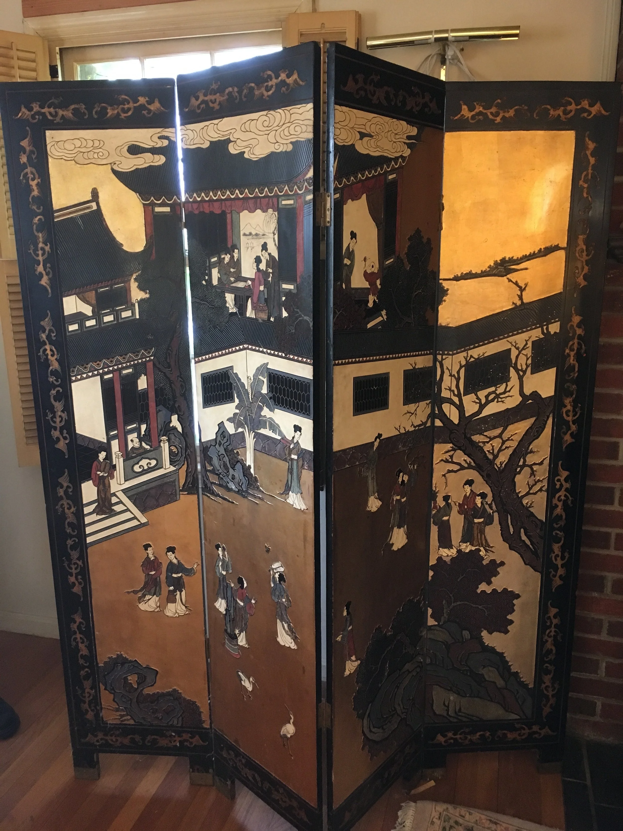 $1000 - Set of Four Black lacquer vintage Oriental scenic divider panels, 6', carved handpainted, gold leaf. minor wear and tear.