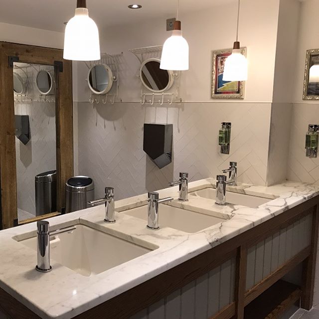 Interesting arrangement of taps &amp; sinks to maximise use of space in these ladies loos. #gooddesign #interiors #bathroomdesign #rachelkelseydesign