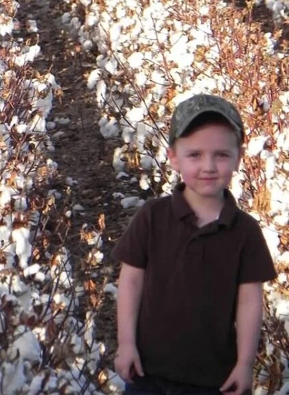 son in cotton field.jpg