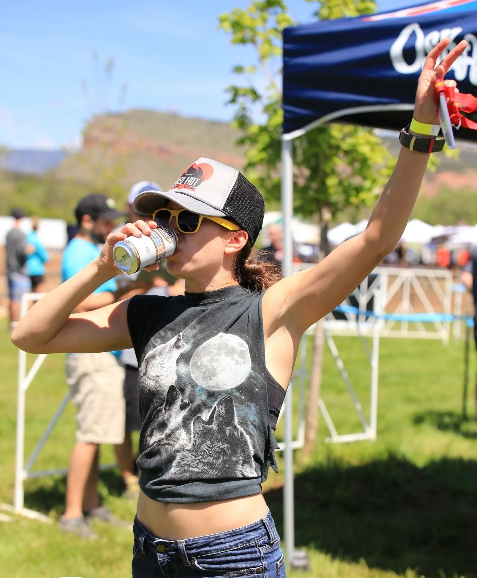 Girl drinking at the Beer Relay.jpg