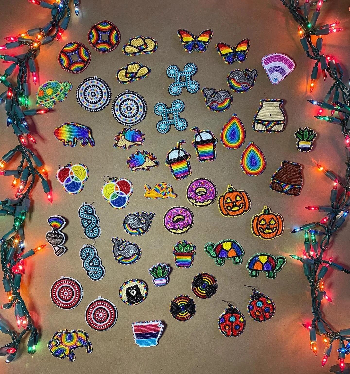 final call for holiday shipping! all pins & earrings have been reduced & make great stocking stuffers — proceeds will feed disaster victims & fund our local Pride organization.