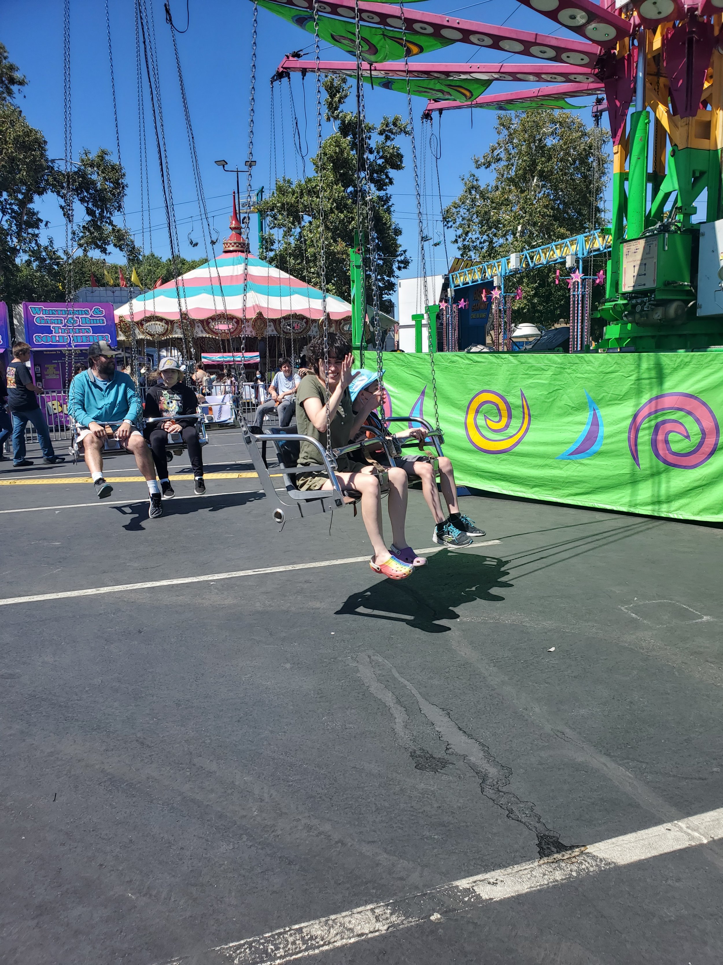 Caitlin waves from the swing 20220706.jpg