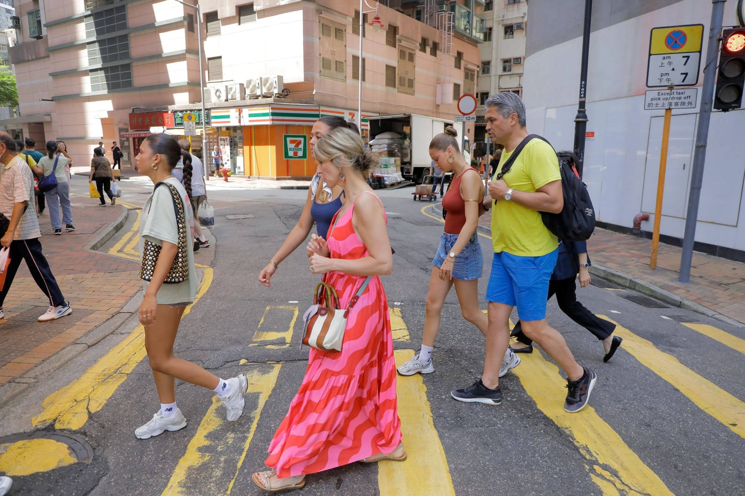 Hello Hong Kong guests crossing the HK street