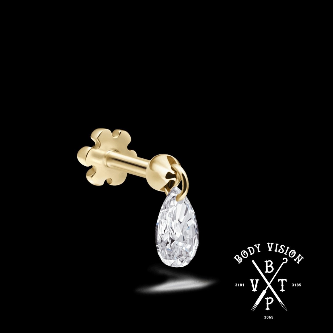 Carefully crafted to rest delicately against the skin, this vibrant pear-shaped bling  gives the illusion of effortlessly hovering on the ear. With its patented solid gold charm mechanism, the stone enjoys a gentle sway, creating a dazzling play of l