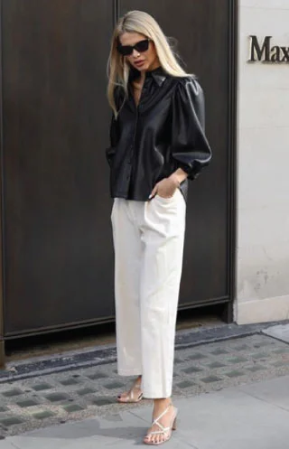 Blogger @kiraatikova wearing a Zara imitation leather shirt.