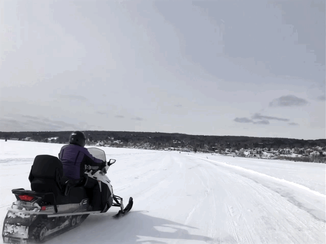  Snowmobiles on the Ice Road 
