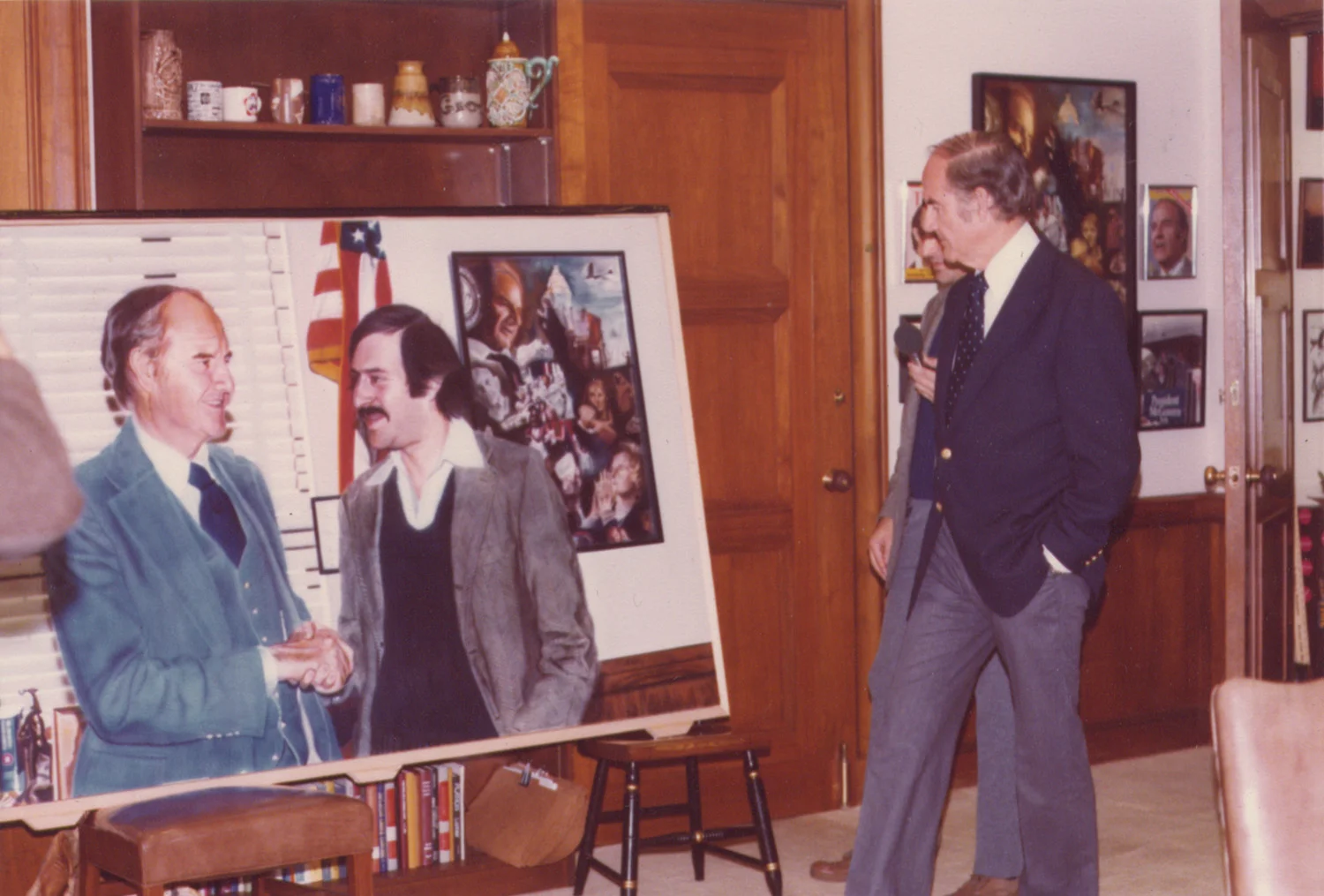 Senator McGovern admiring the painting