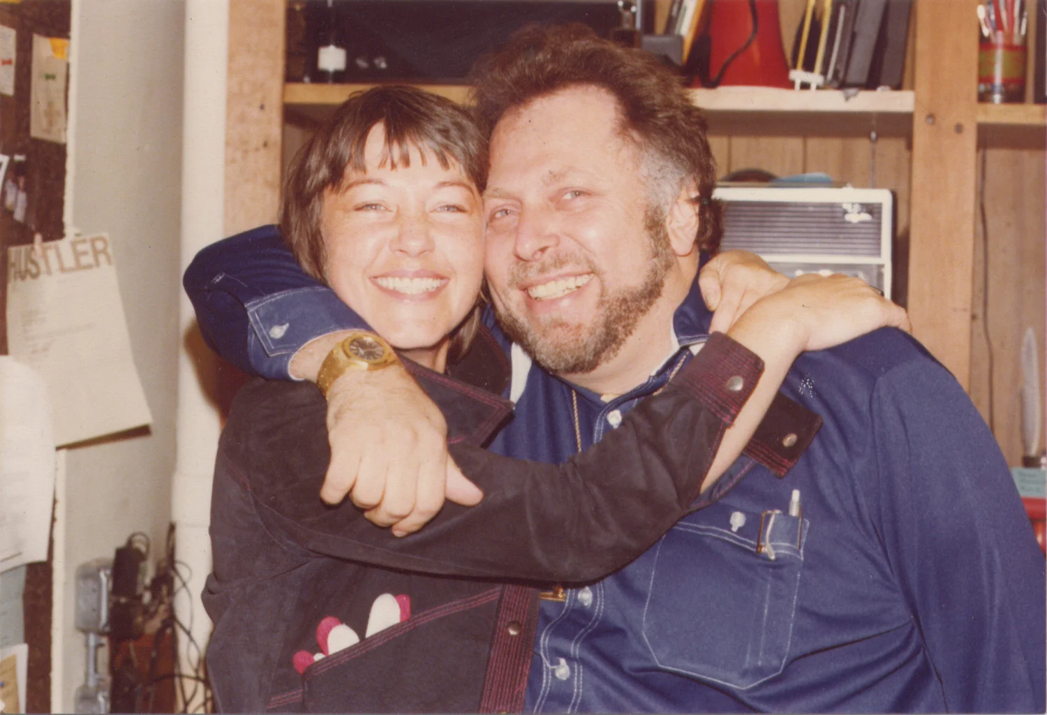Bettie Ringma giving Al Goldstein a hug.