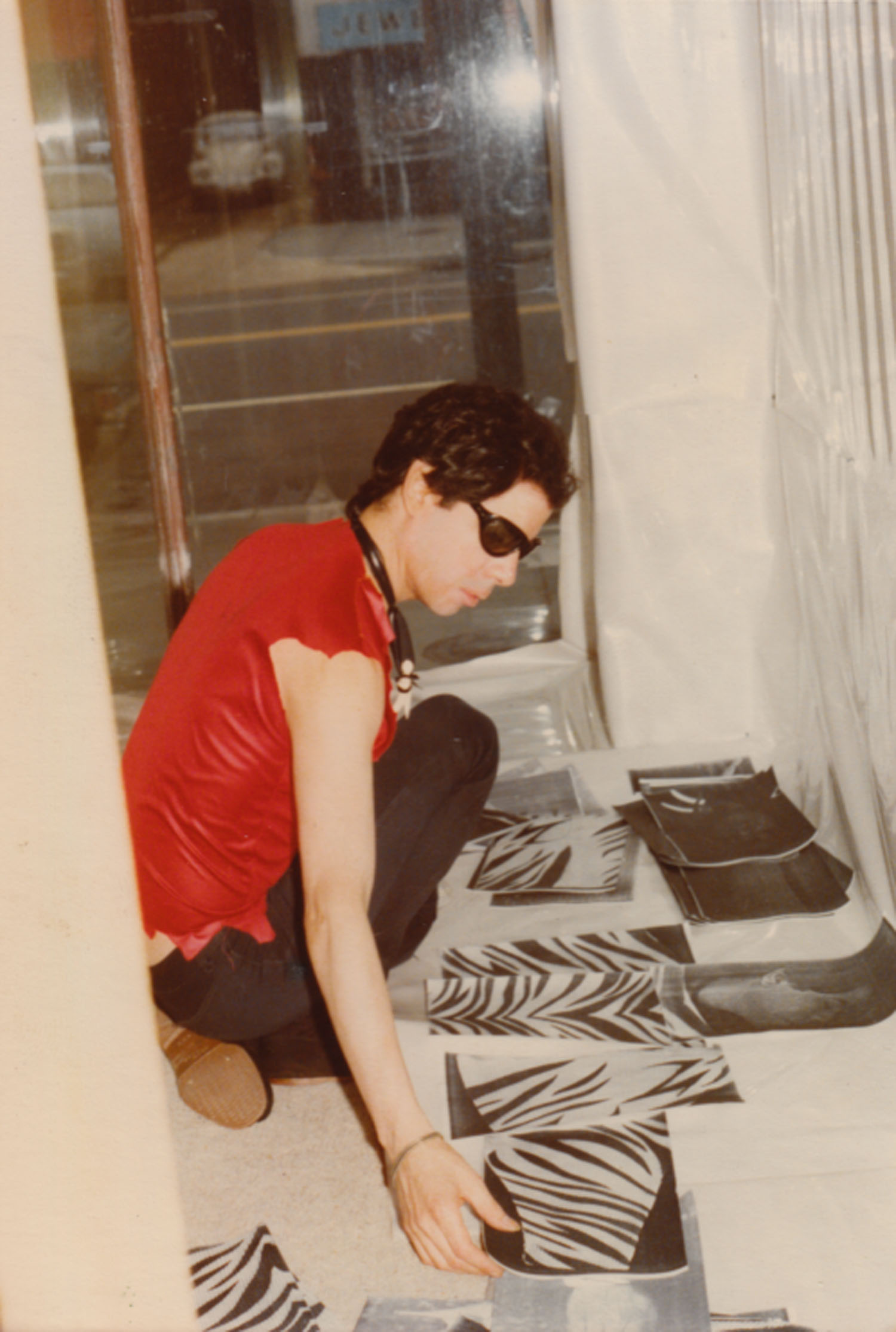 Daimon working on the window installation at the Punk Art Exhibition, Washington DC, 1978
