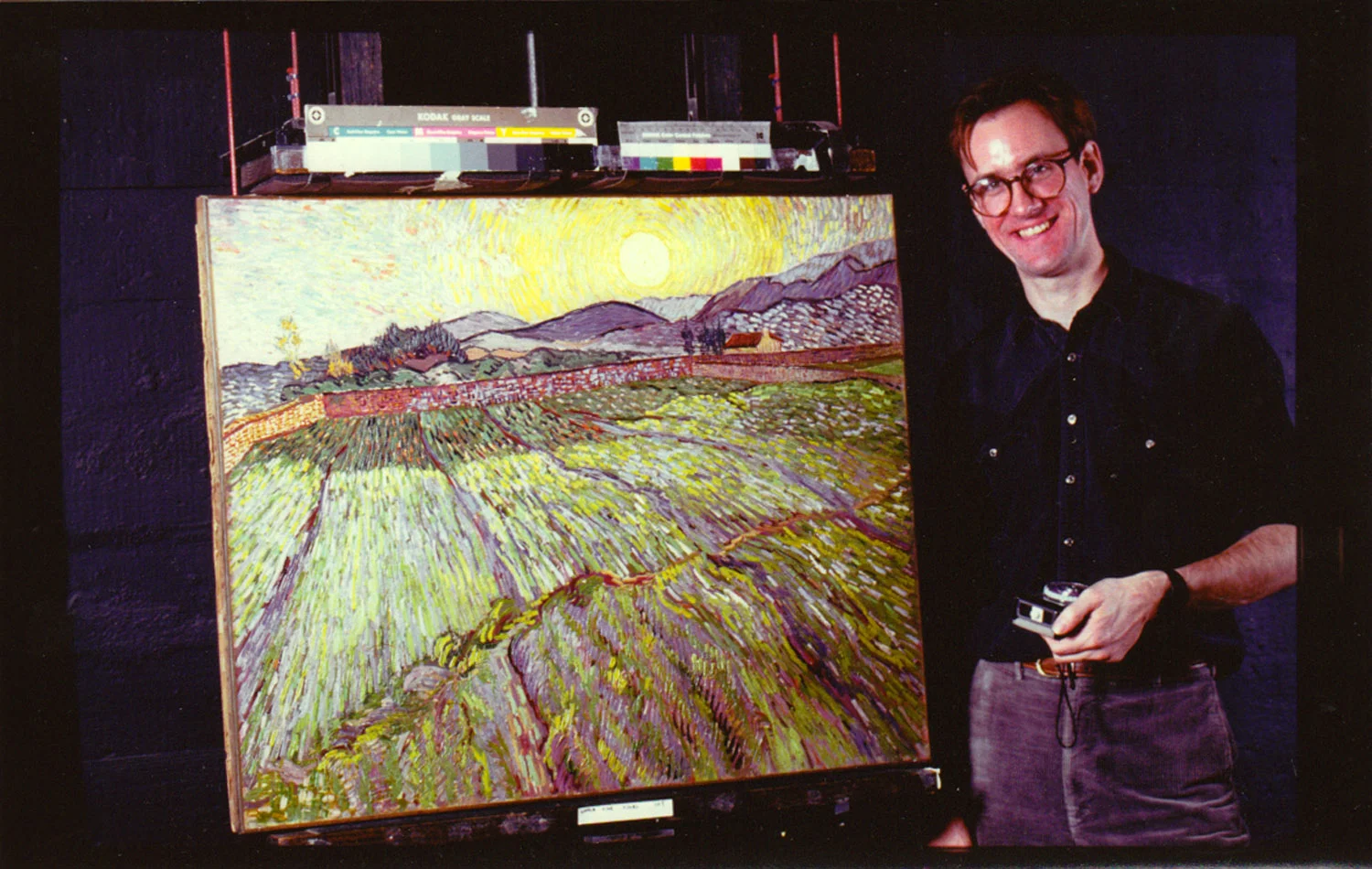 Tom Warren, Vincent Van Gogh's painting "Landscape with Rising Sun" at Sotheby's Auction House, 1985