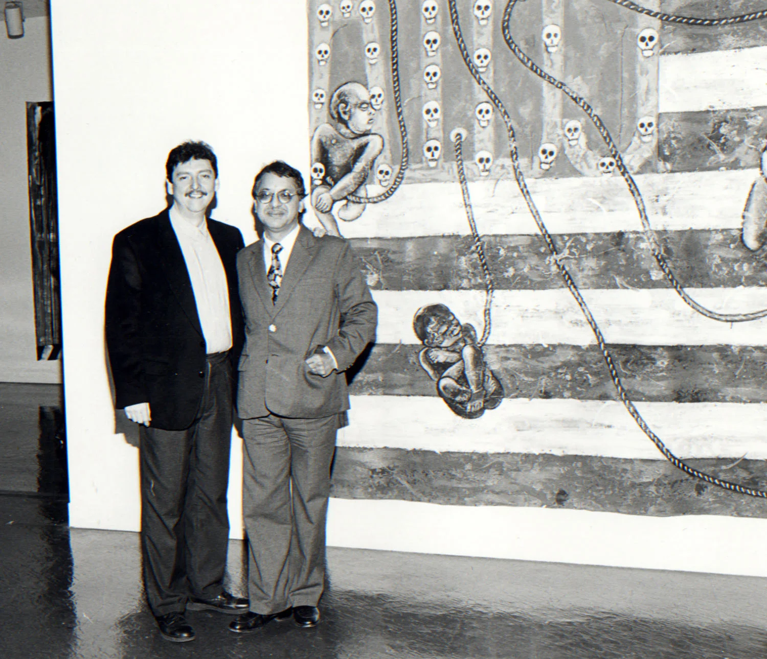 Luis Cruz Azaceta with his son at the opening of his exhibition The Aids Epidemic Series, 1991