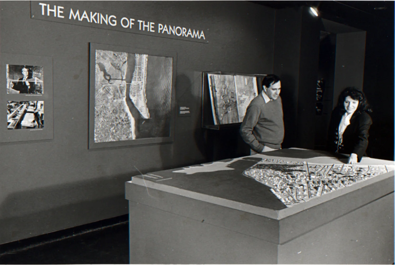 Marc Miller and Donna Tuman, curator of education, examine the never-installed Far Rockaway section of the Panorama, 1987.