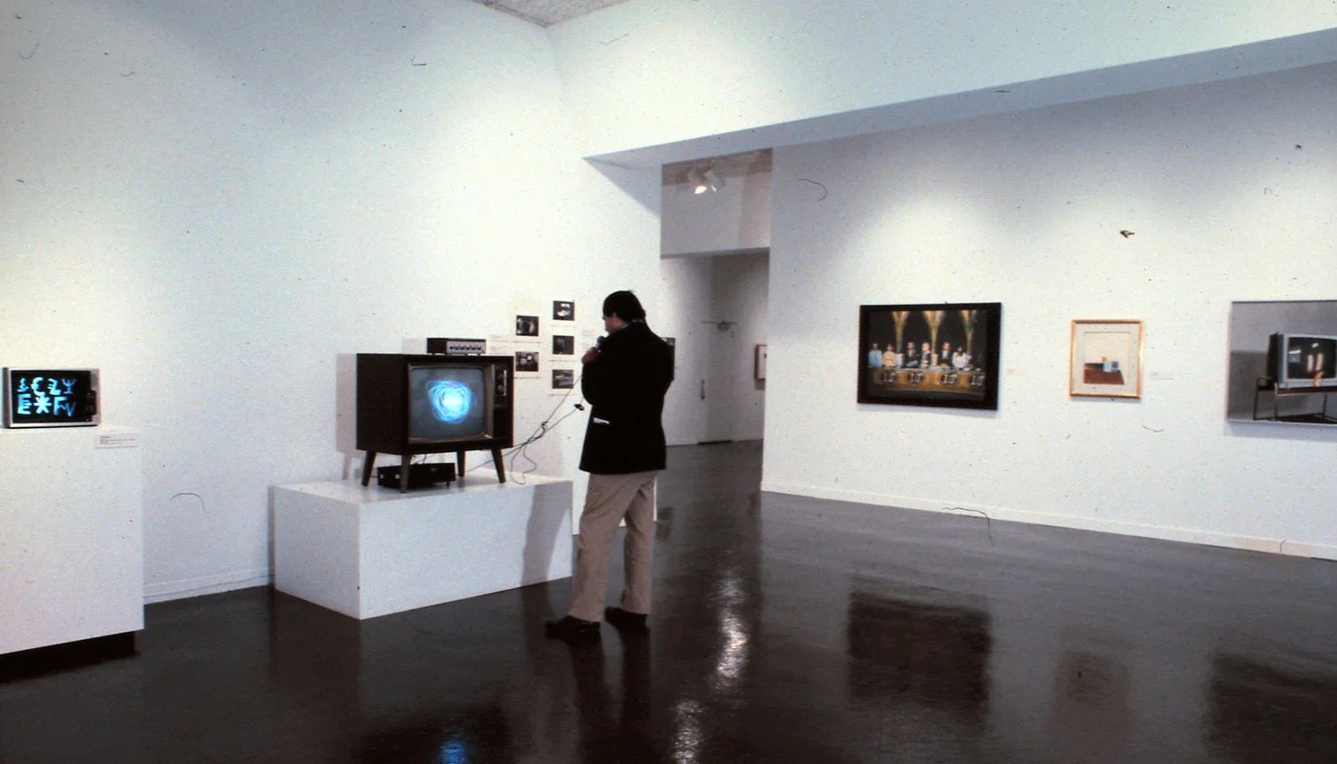 Left to right: Isidore Isou, Ragged Television; Nam June Paik, Participation T.V.; Peter Moore, Photo Documentation; unidentified; unidentified; Robert Bechtle, Zenith.