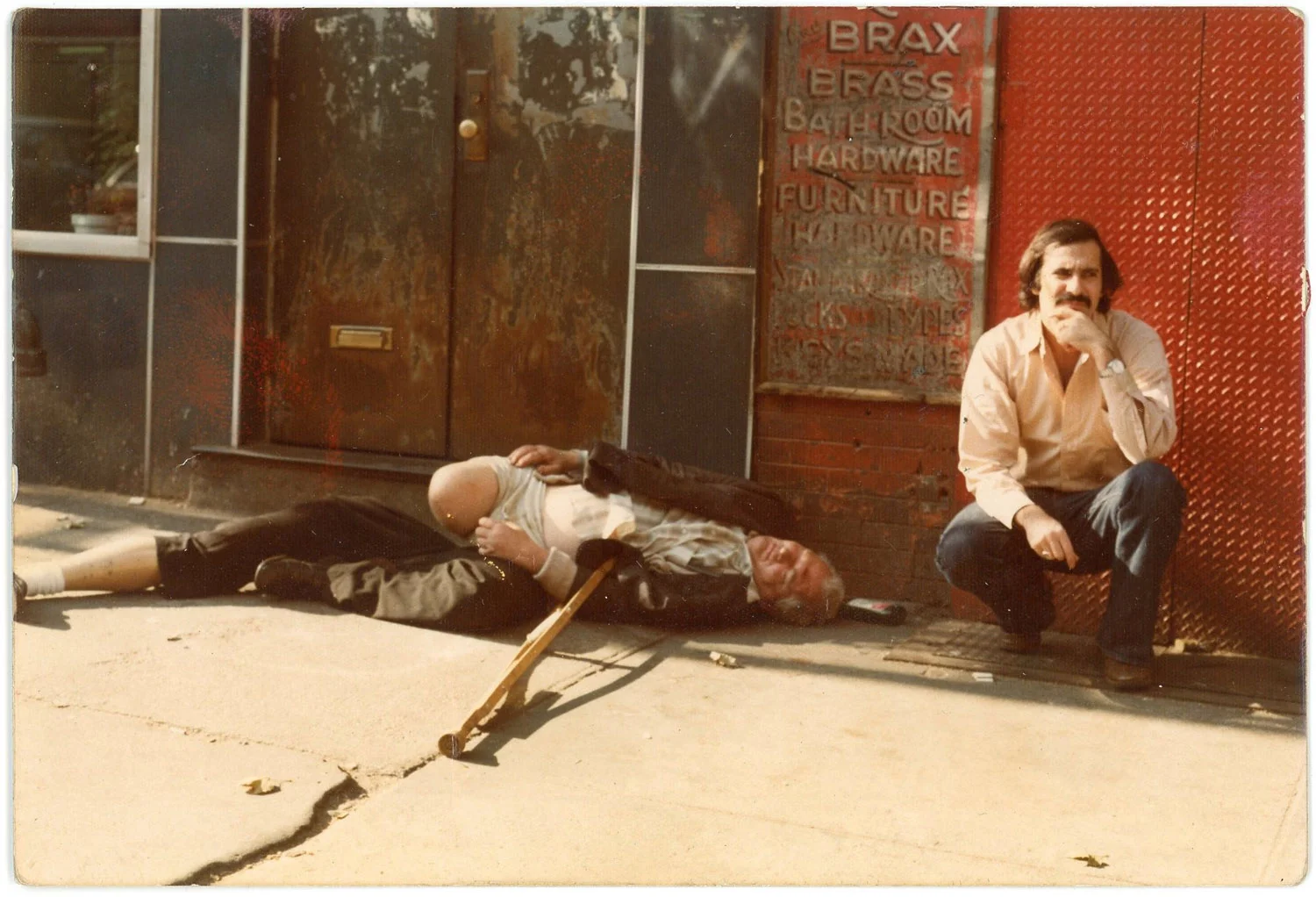 Outside the doorway to 98 Bowery with Harry’s Bar to the left, 1975