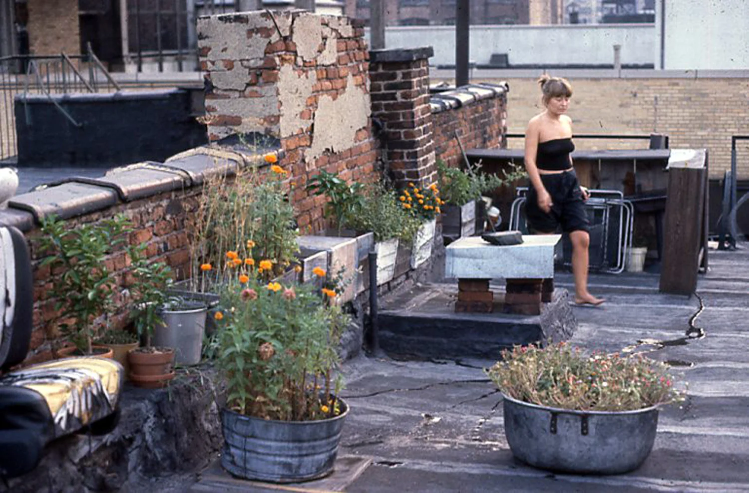 Becky Anderson Hoppe on the roof, c. 1978.