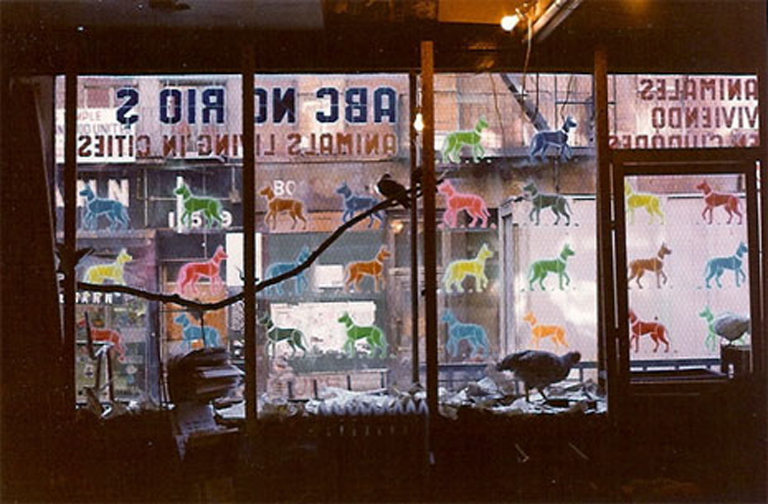 Dog stencils on the front window of ABC No Rio by Anton Van Dalen. Photo by Anton Van Dalen