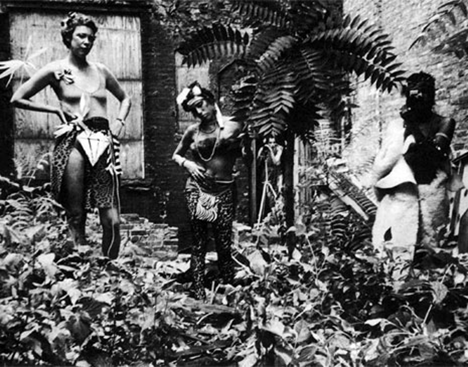 Cave girls in No Rio's backyard. From left, Becky Howland, Judy Ross, Kiki Smith and Marnie Greenholz. Photo by Teri Slotkin