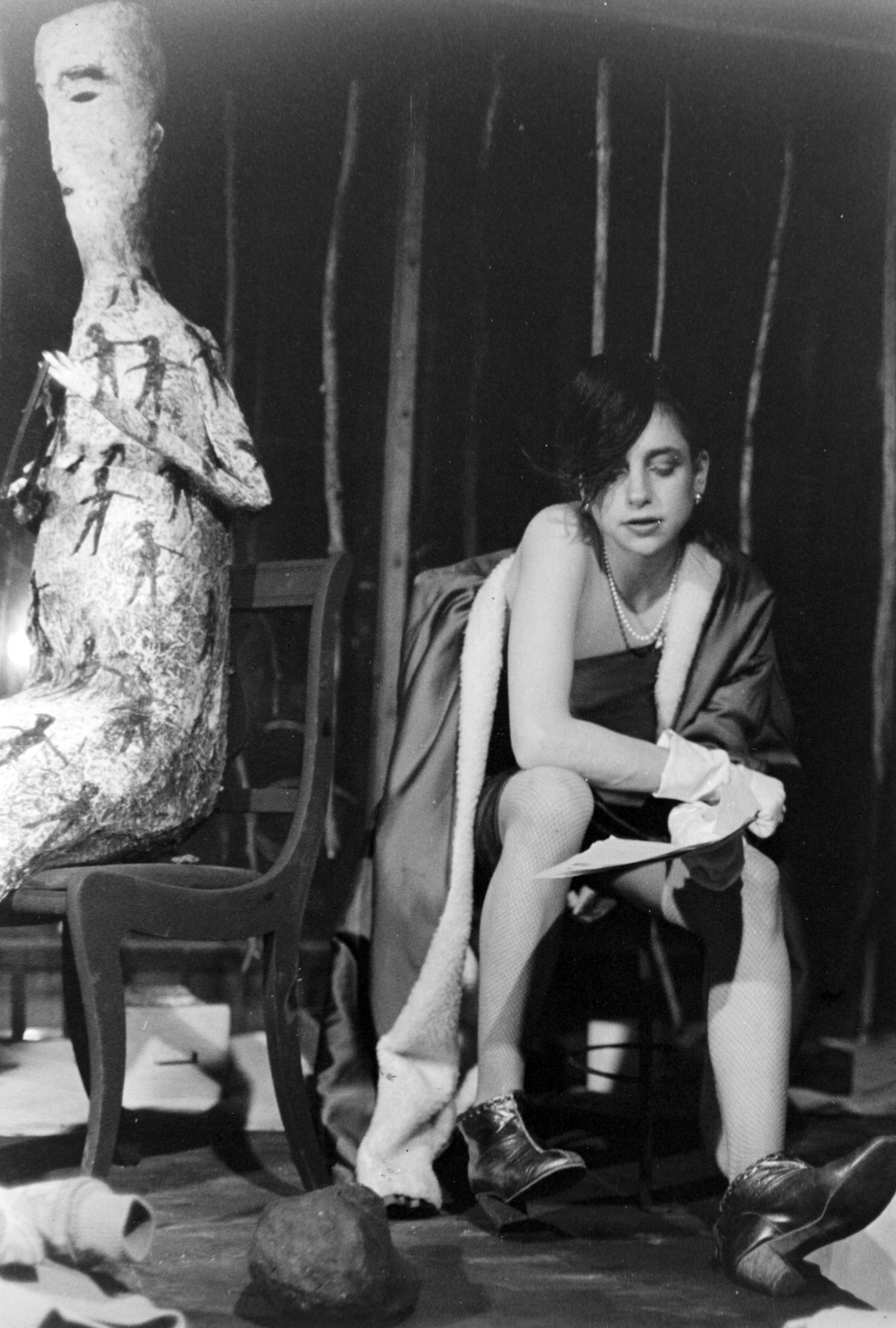 Eve Teitlebaum sits on stage with Kiell Olsen's sculpture by her side. Photo by Hector Gonzalez