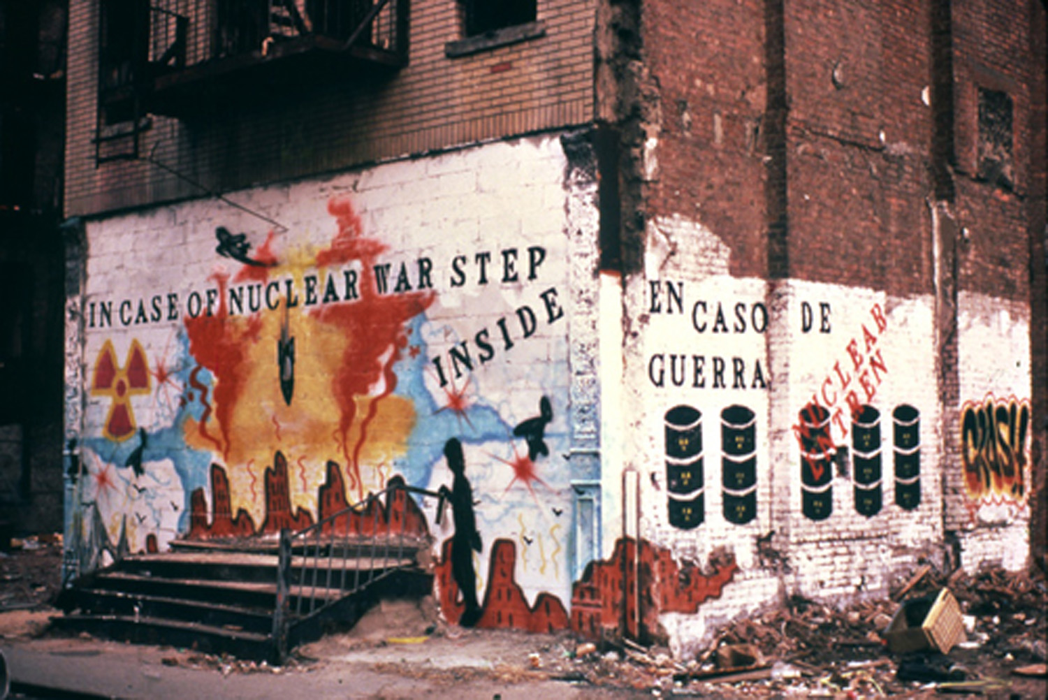 John Fekner and Johnny "Crash" Matos, Fallout Shelter Mural on Suffolk Street. The building on which the mural was painted was knocked down shortly thereafter. Photo by Jack Fekner © 1981