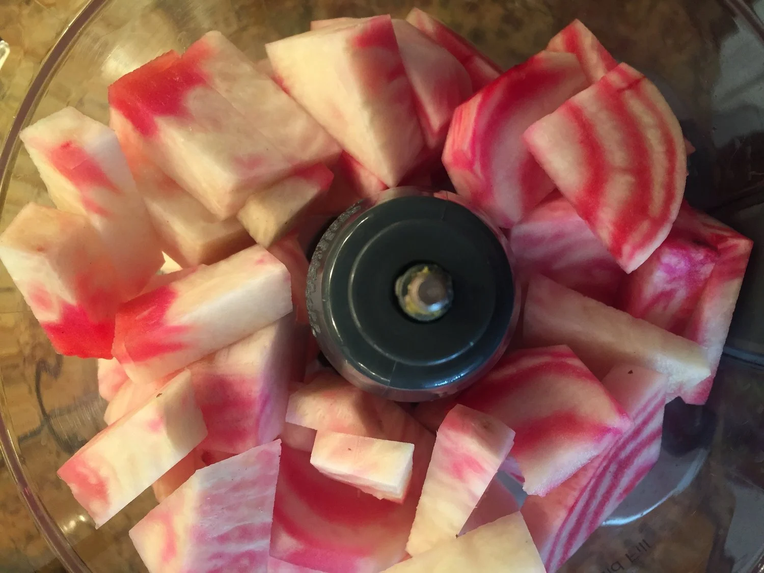 Place chopped beets, like these, in food processor and mix until the beets are the size of rice. Then remove from processor and measure 1 cup.