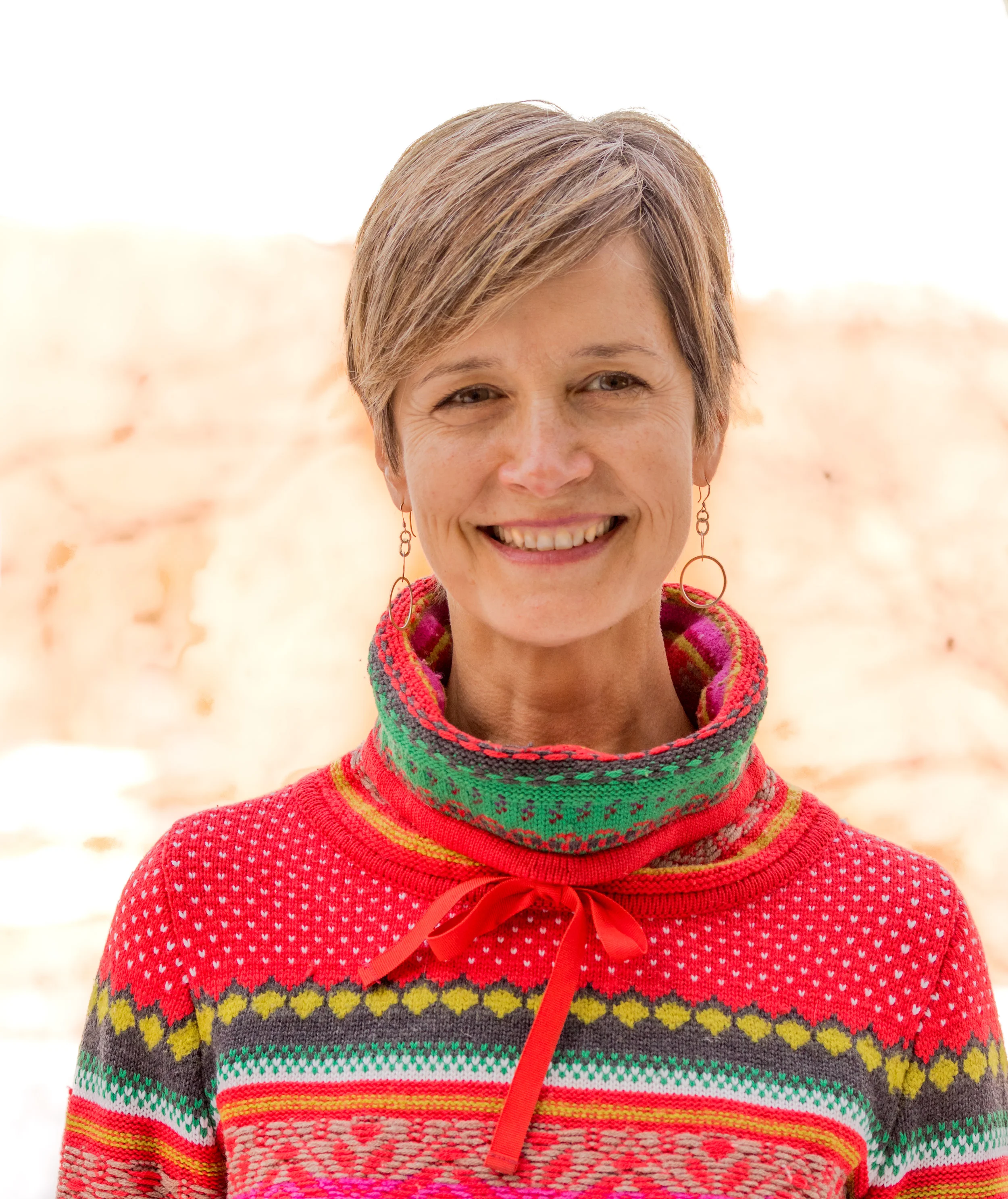 An image of Susan Cahill, a woman with a warm smile