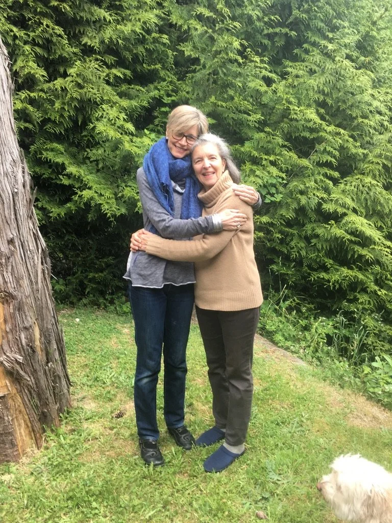 Susan embracing her teacher, Janet Adler
