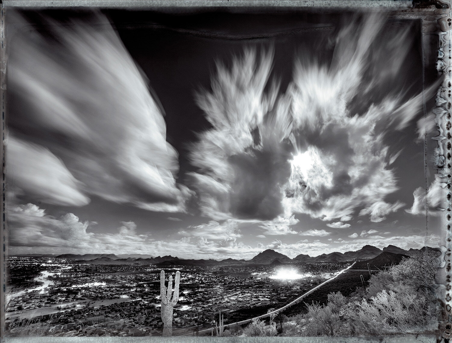 Clouds over Tucson facing southwest, day and night from A-Mounta